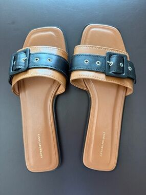 Anthropologie Tan and Black Buckle Slides